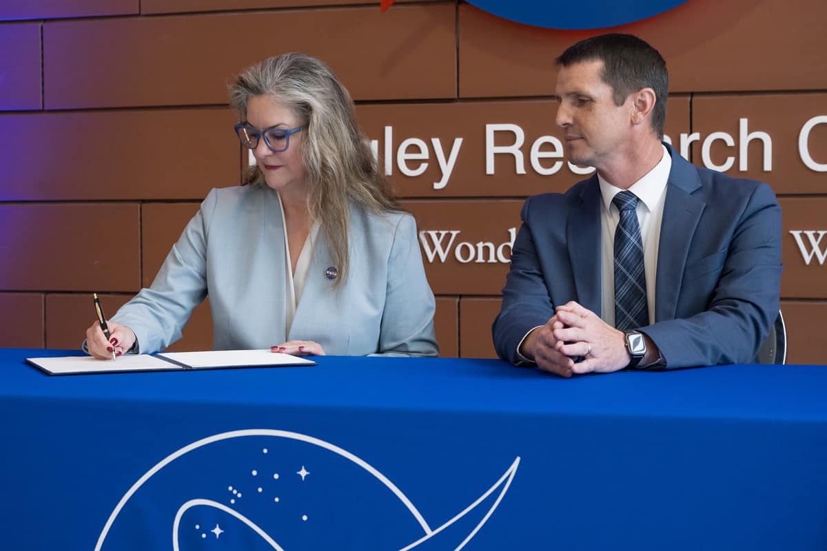 NASA’s Langley Research Center Acting Director Dr. Trina Marsh Dyal (left) and Dr. Jeremy Ernst, vice president for Research and Doctoral Programs at Embry-Riddle, complete the signing of a Space Act Agreement during a ceremony held at the facility in Hampton, Virginia.